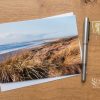 Changing Light On Camber Sands, greeting card by Nicky Flint